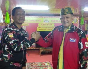 Penyematan Atribut Dang Ike Pembina Laskar Merah Putih Lampung