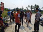Sosok Perempuan Ditemukan Tergeletak Dipinggir Jalan Pintu Tol Kalianda