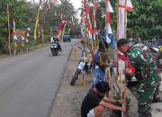 Semarakkan HUT RI Ke-80, Babinsa Koramil 421-06/Natar Dan Warga Pasang Bendera Merah Putih dan Umbul-Umbul
