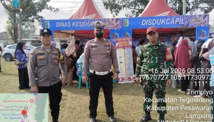 Babinsa Trimulyo Hadiri Pesta Rakyat dan Pasar Murah, Semarakkan HUT ke-19 Pesawaran